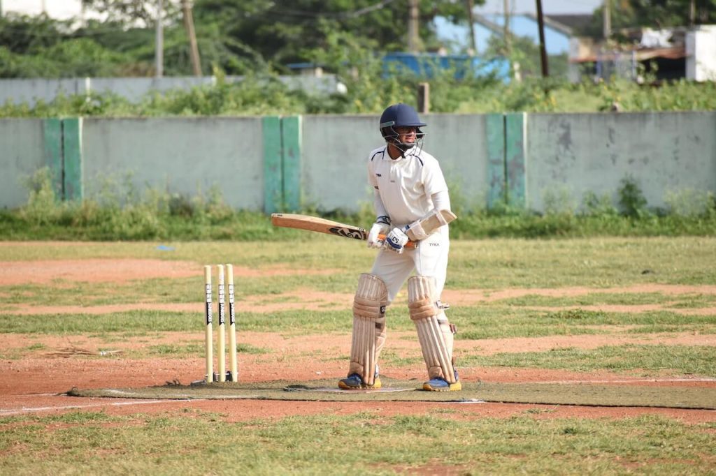 a man playing cricket